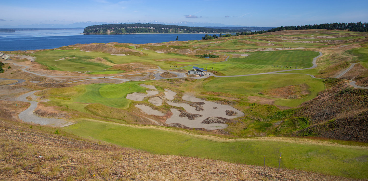Chambers Bay public golf course in University Place, Washington, southwest of Tacoma with sweeping views of Puget Sound and the Olympic Mountains.