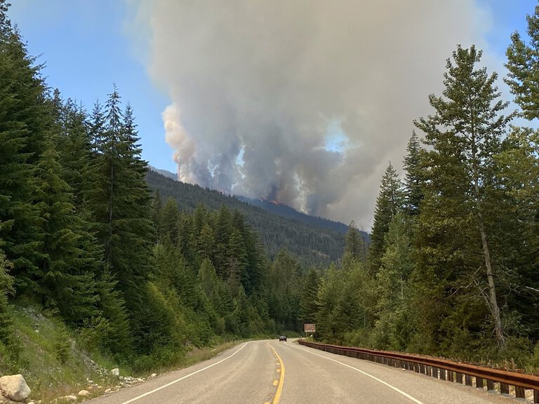 Methow Valley fires forced the closure of a portion of state Route 20, the North Cascades Highway. It’s closed from milepost 165 and 185, about 8 miles west of Winthrop. Above, the Cedar Creek Fire is seen from Highway 20 on Monday, July 12, 2021.
