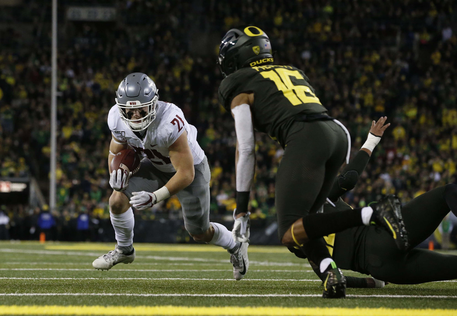 Washington State running back Max Borghi (21) was named to the preseason Pac-12 First Team on Tuesday.
