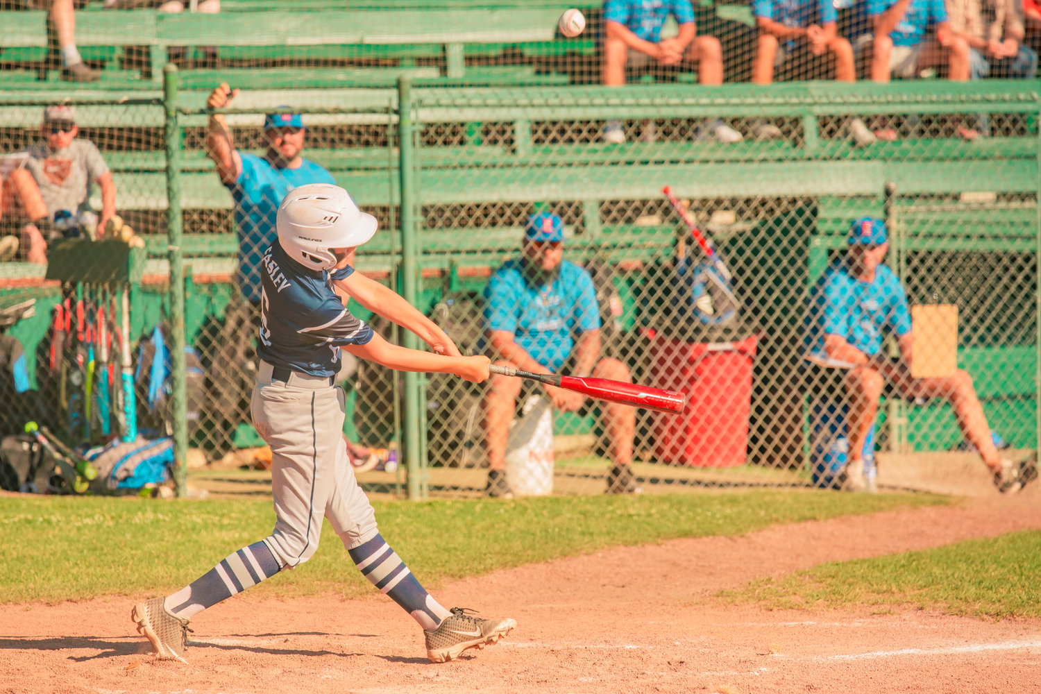 Larch Mountain’s Brody Easley (6) puts his bat on the ball during a game in Centralia at Dick Scott Field on Tuesday.