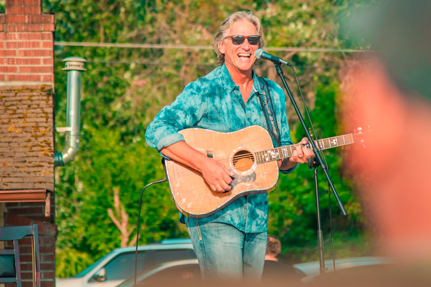 Billy Dean smiles while telling a story during Music at the Park in Chehalis on Friday at Recreation Park.