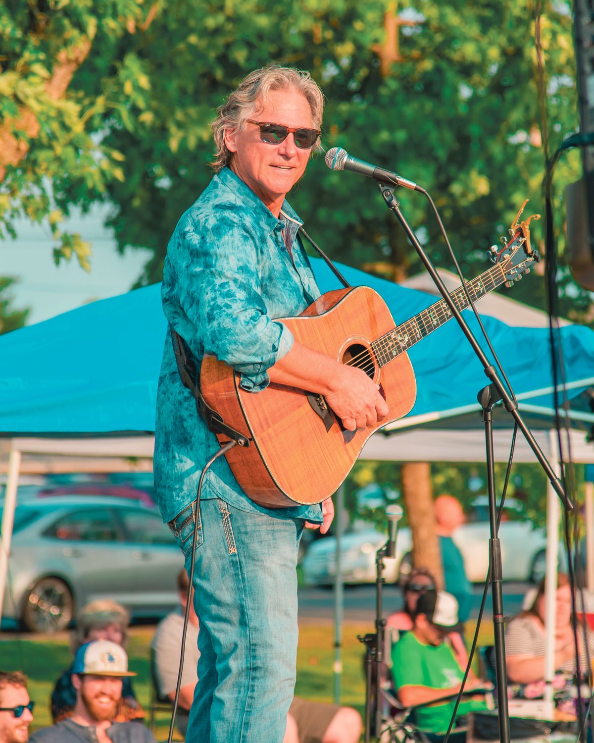 Billy Dean smiles while performing during Music at the Park in Chehalis on Friday at Recreation Park.