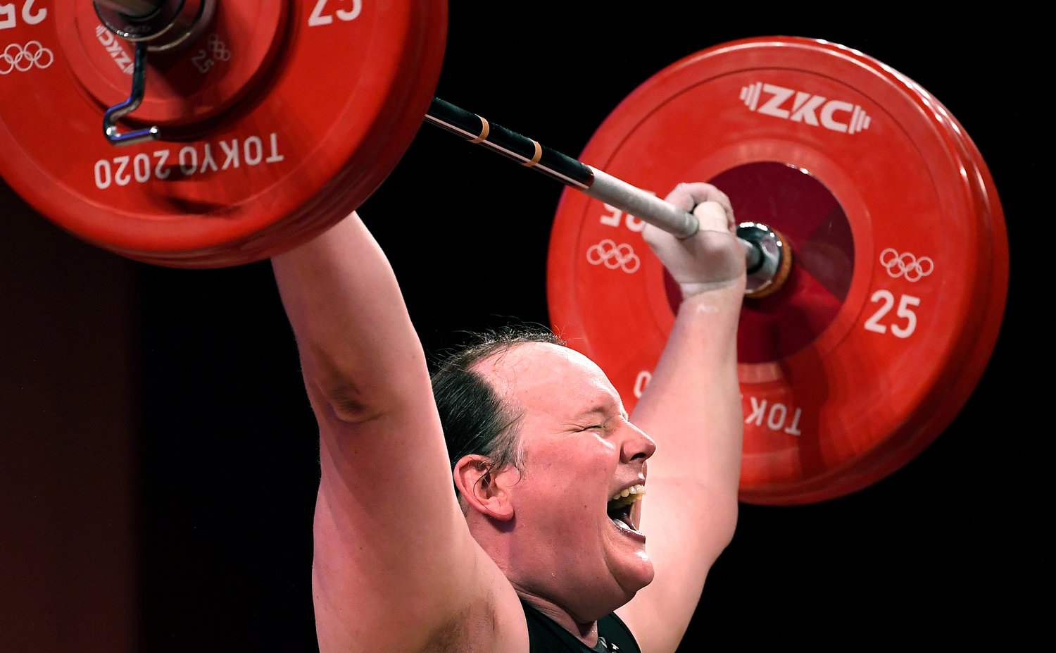 New Zealand's Laurel Hubbard, the first transgender Olympian, can't make the lift on her final try in the women's 87kg weightlifting final at the 2020 Tokyo Olympics on Aug. 2, 2021, in Tokyo.