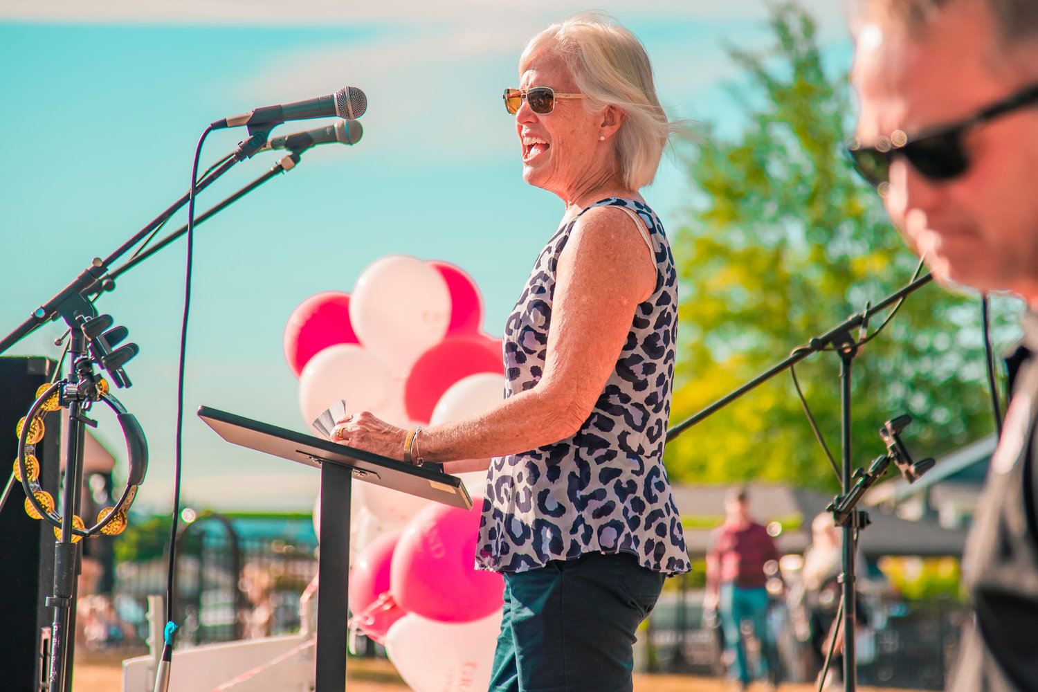 Connie Bode talks during the grand opening ceremony for Penny Playground Friday in Chehalis.
