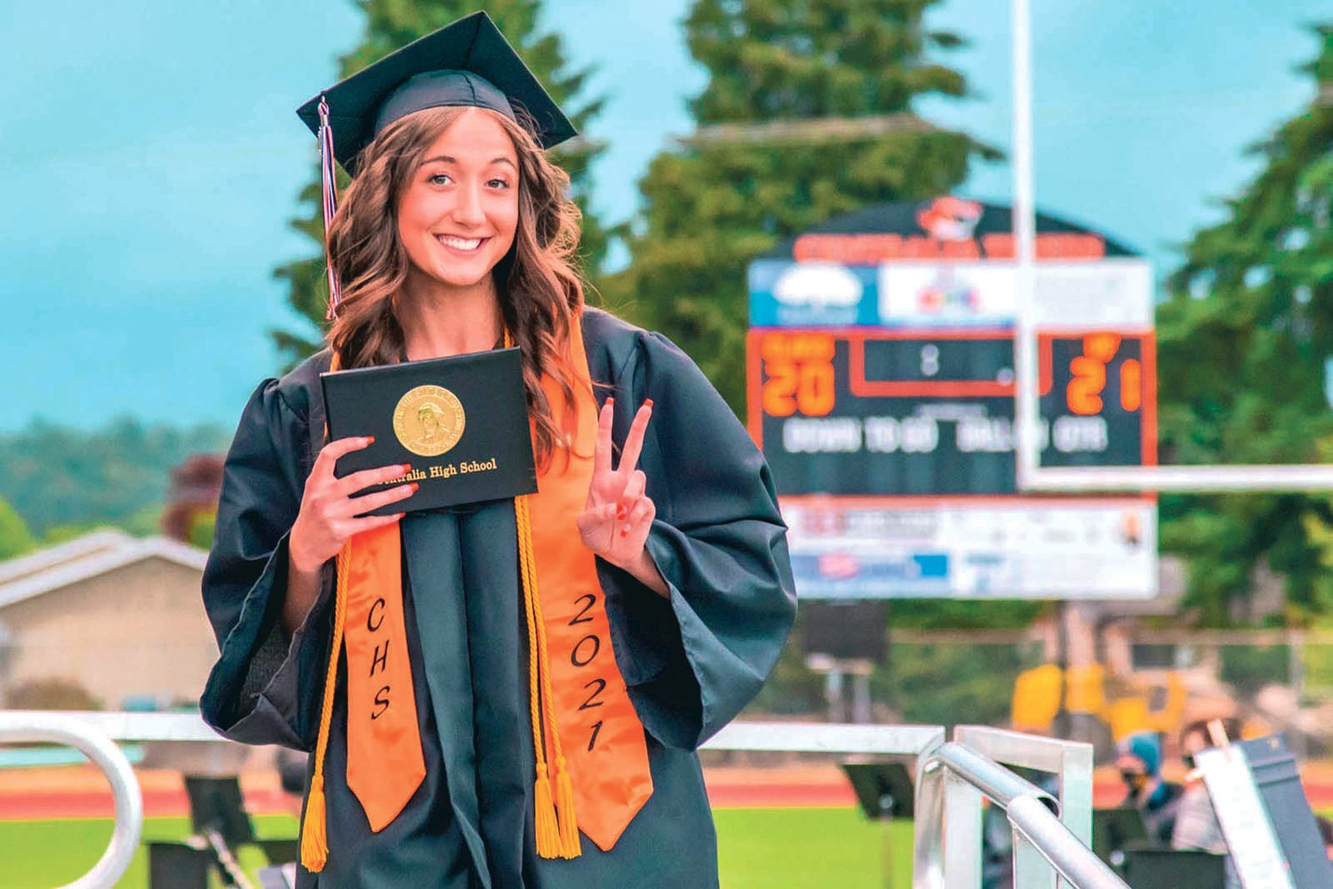Faith Waterfield poses for a photo during the 2021 Centralia High School graduation ceremony.