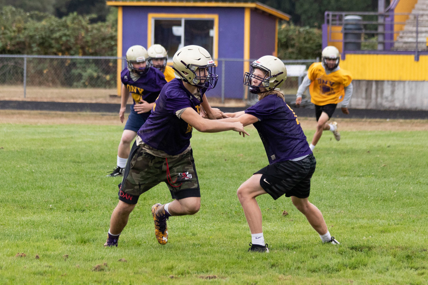 Fullback/linebacker Marshall Haight pursues the ballcarrier in a drill at Onalaska's first practice of the fall season Wednesday morning.