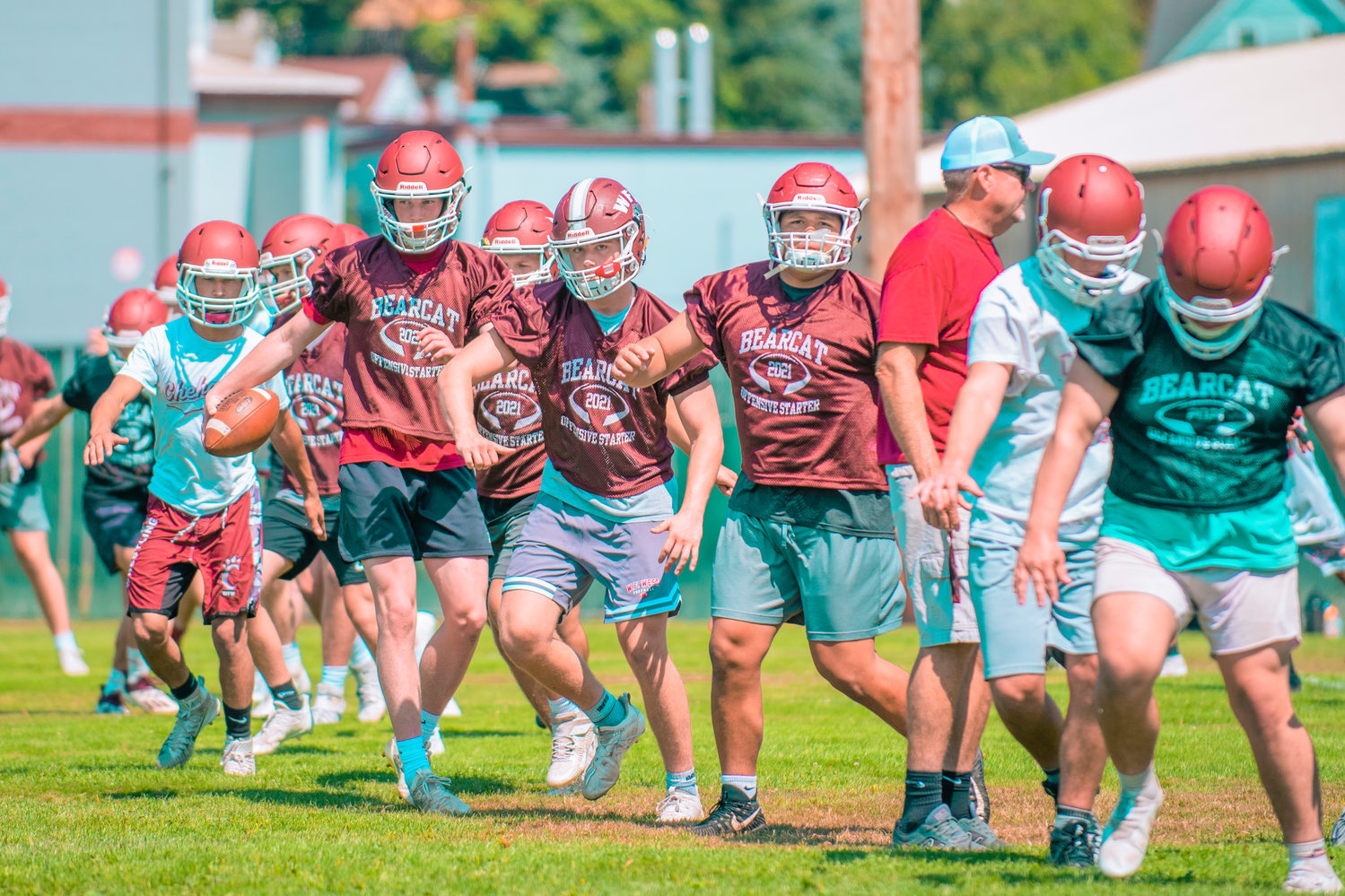 W.F. West football players run through conditioning drills during the first practice of the fall season on Wednesday.