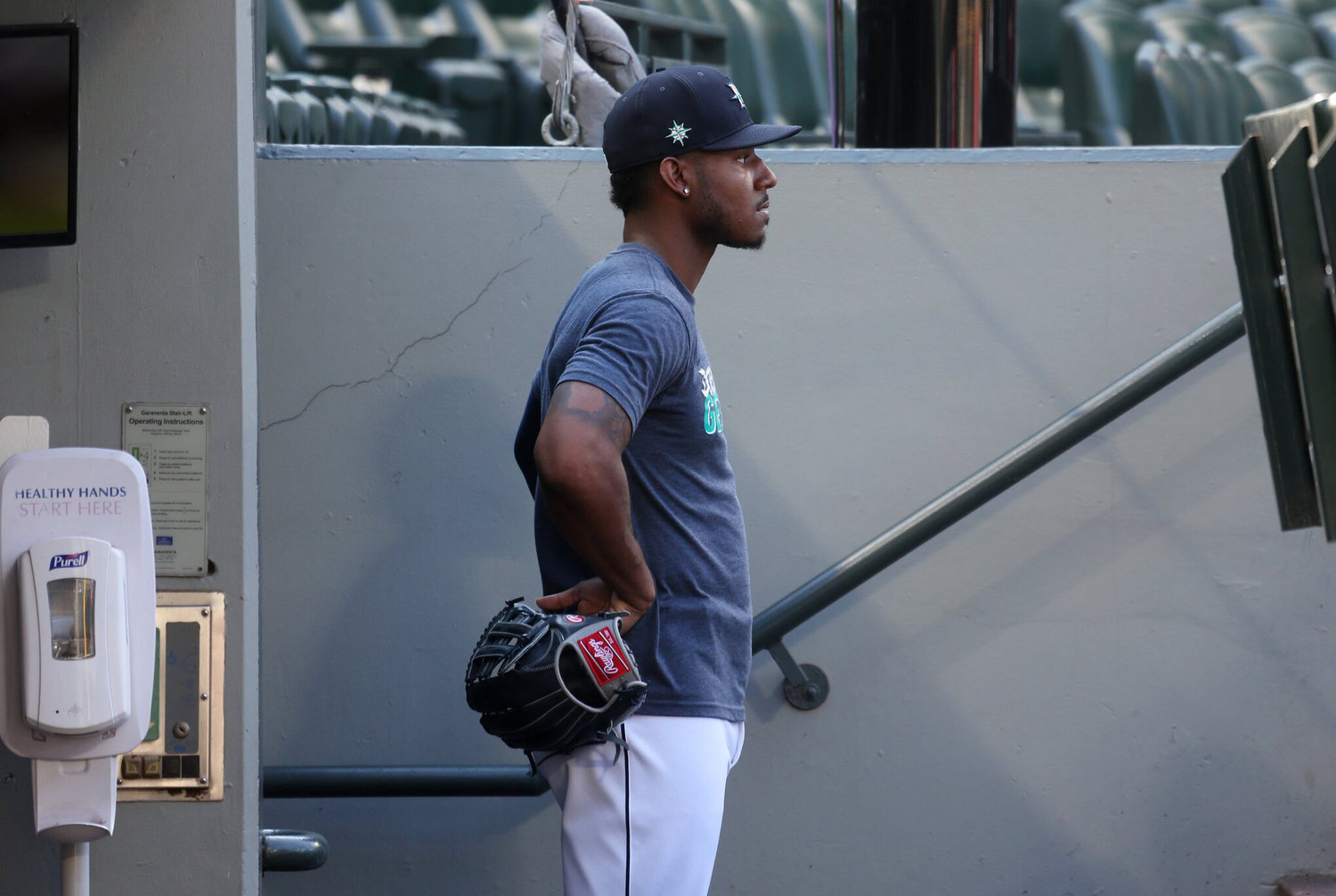 Kyle Lewis watches batting practice from the dugout before a game against the Astros last month.