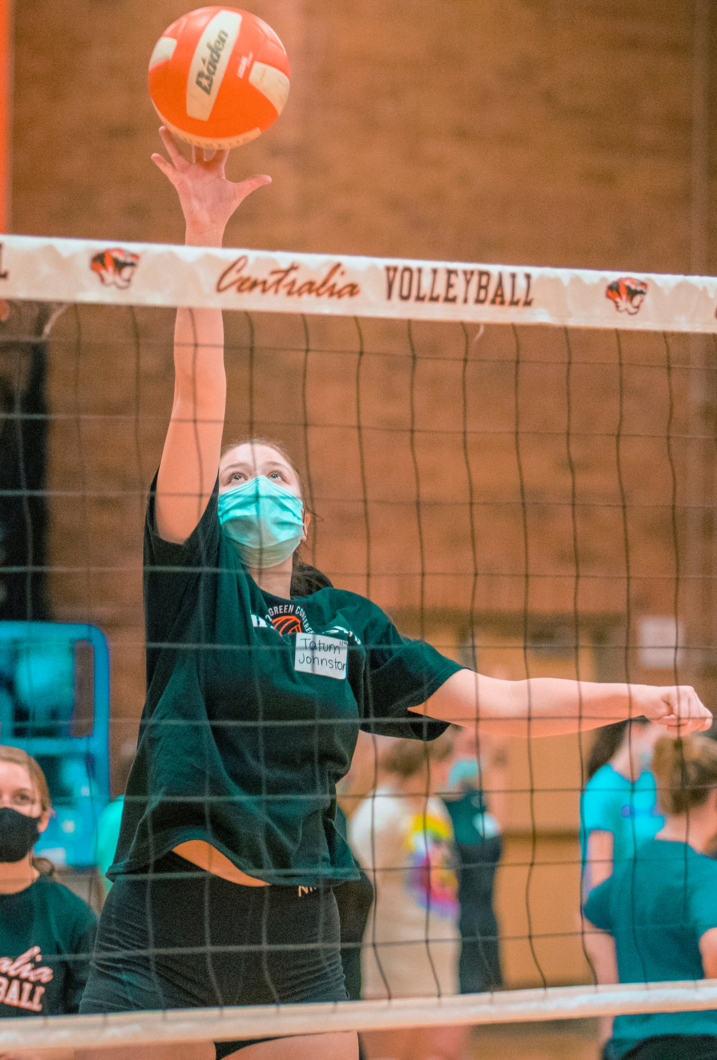 Centralia junior Tatum Johnston hits the ball at the net during practice on Tuesday.