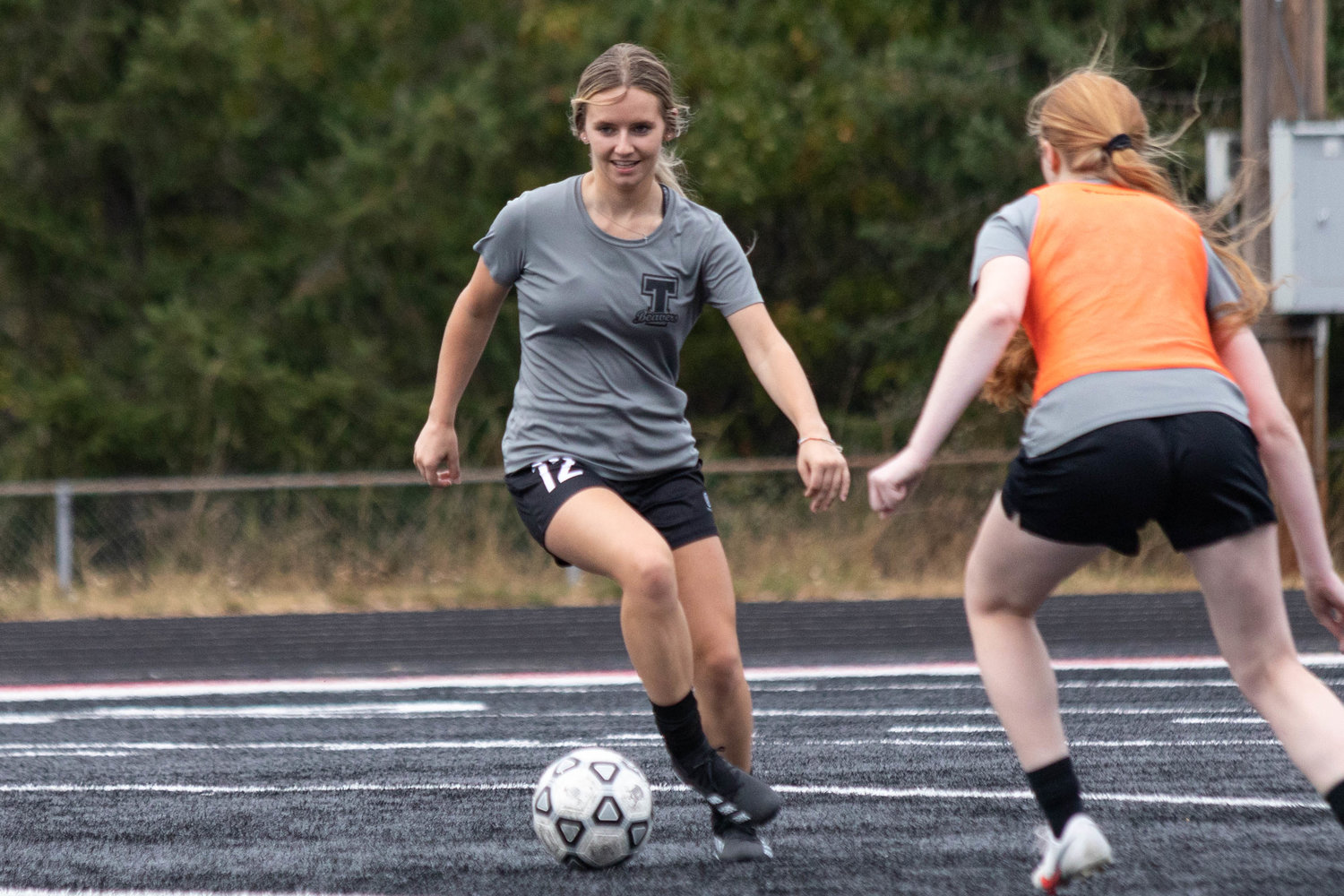 Senior Grace Vestal (left) is defended by Andee Schaffran (right) at Monday afternoon's Tenino practice.