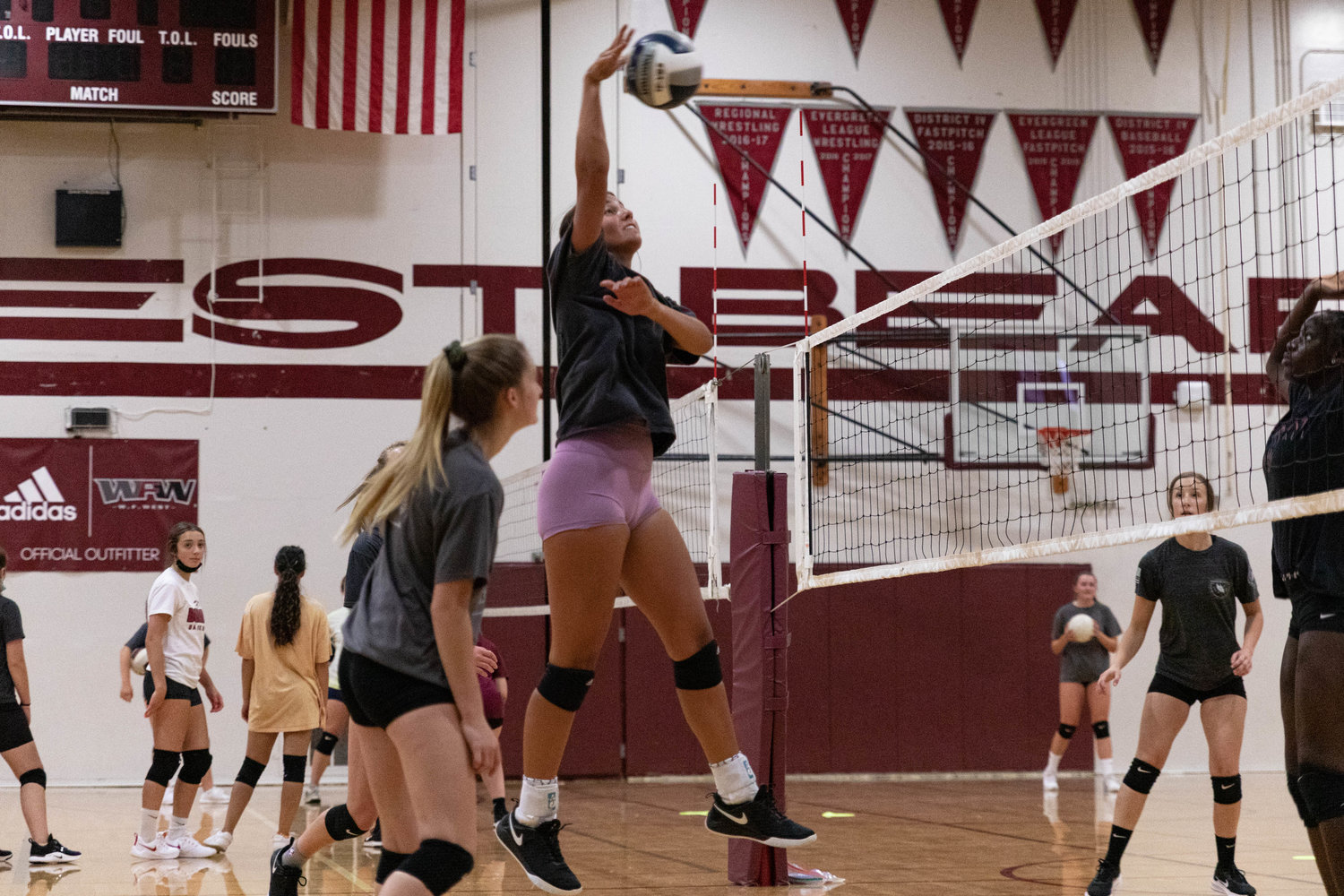 Senior Anna White spikes the ball during W.F. West's practice Tuesday.