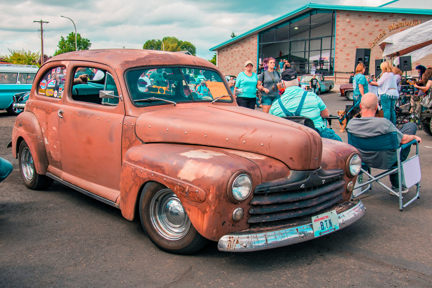 A rusty 1947 Ford Sedan sits on display at the Rust or Shine Car Show and Music Festival in Chehalis on Sunday.