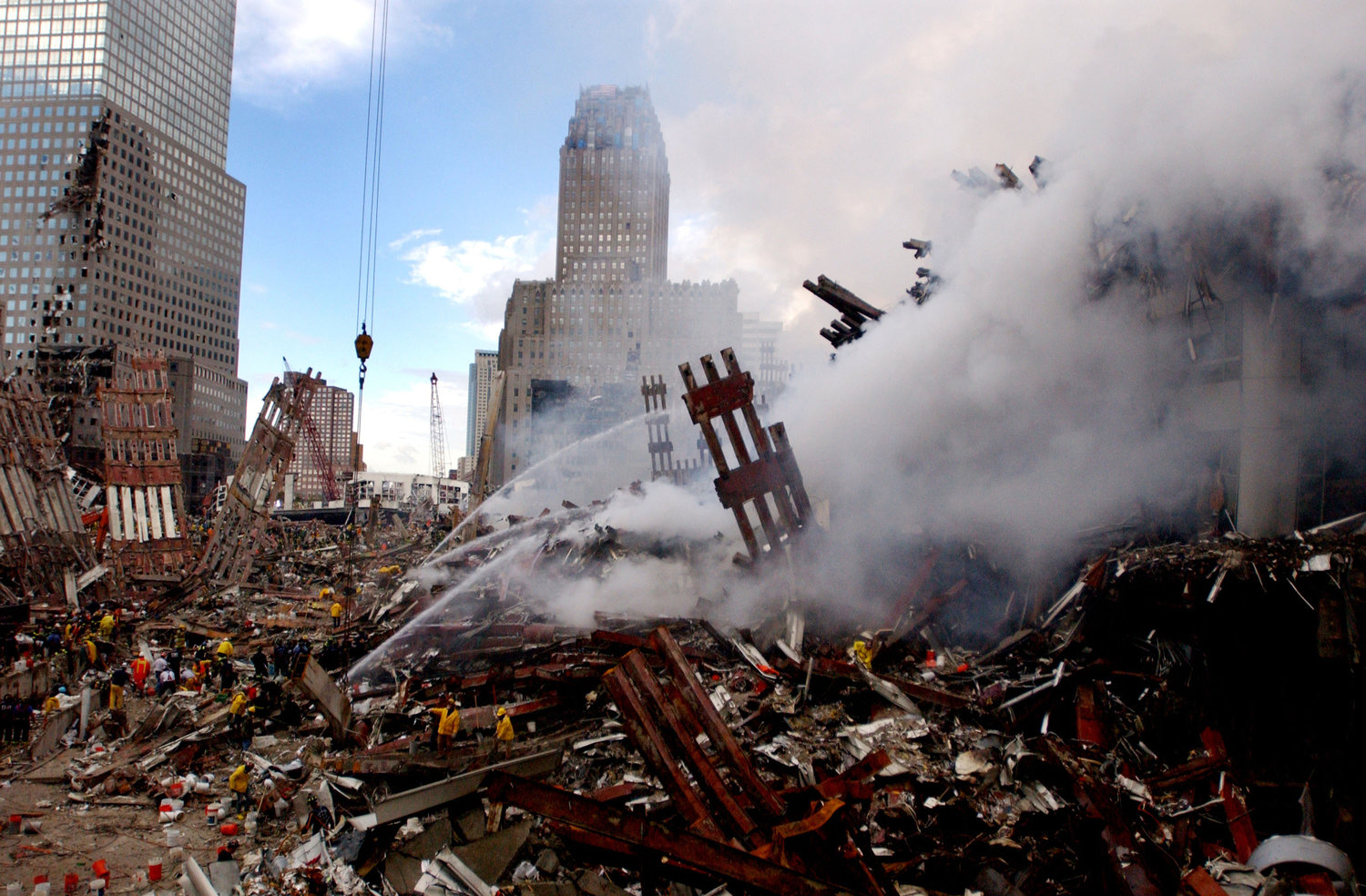 Fires still burn amidst the rubble of the World Trade Center on Sept. 13, 2001, days after the Sept. 11, 2001, terrorist attack. (Jim Watson/U.S. Navy/Getty Images/TNS)