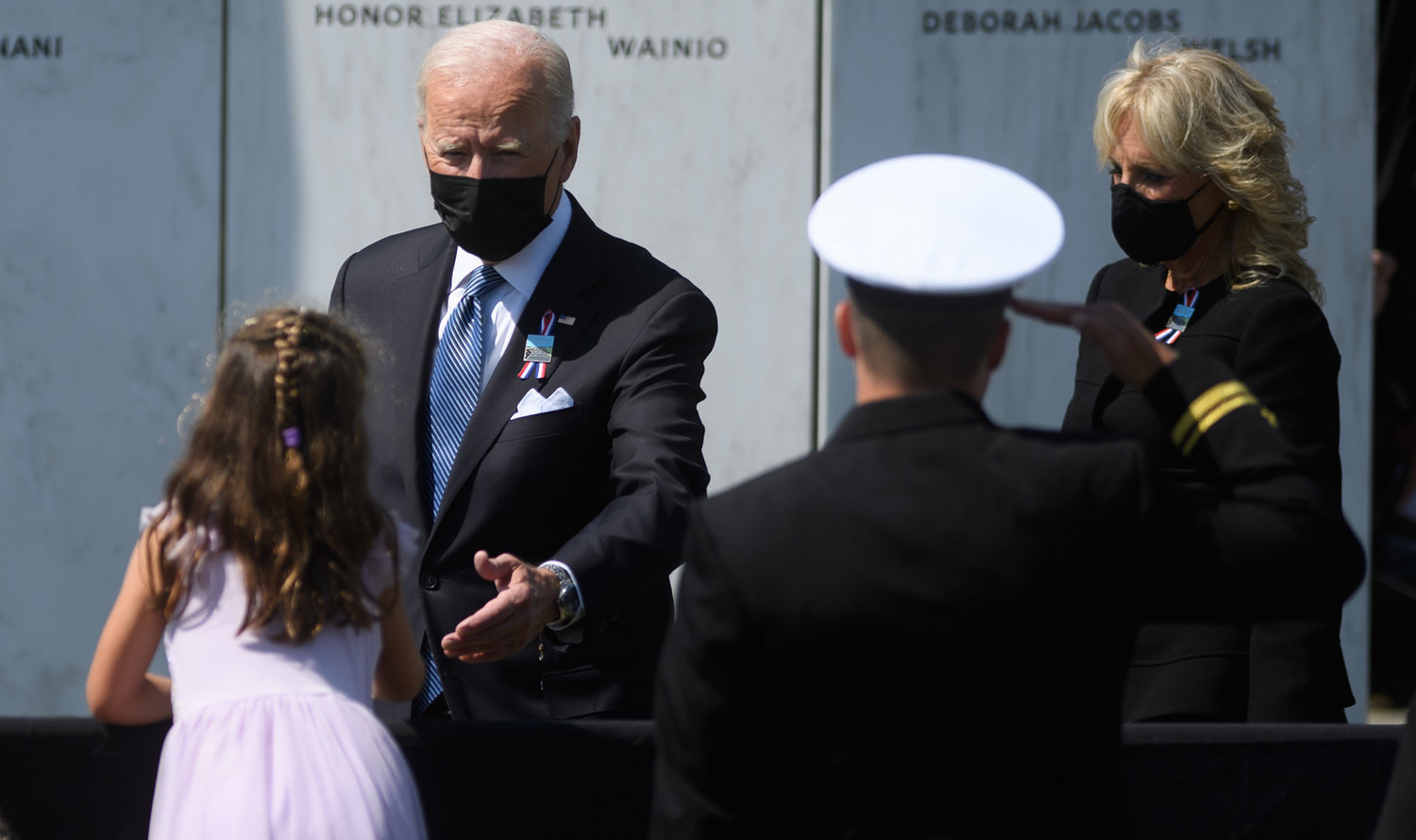 President Joseph Biden and his wife, first lady Jill Biden, attend a wreath-laying ceremony at the 20th Anniversary remembrance of the September 11, 2001, terrorist attacks at the Flight 93 National Memorial on Saturday, Sept. 11, 2021, in Shanksville, Pa. (Jeff Swensen/Getty Images/TNS)
