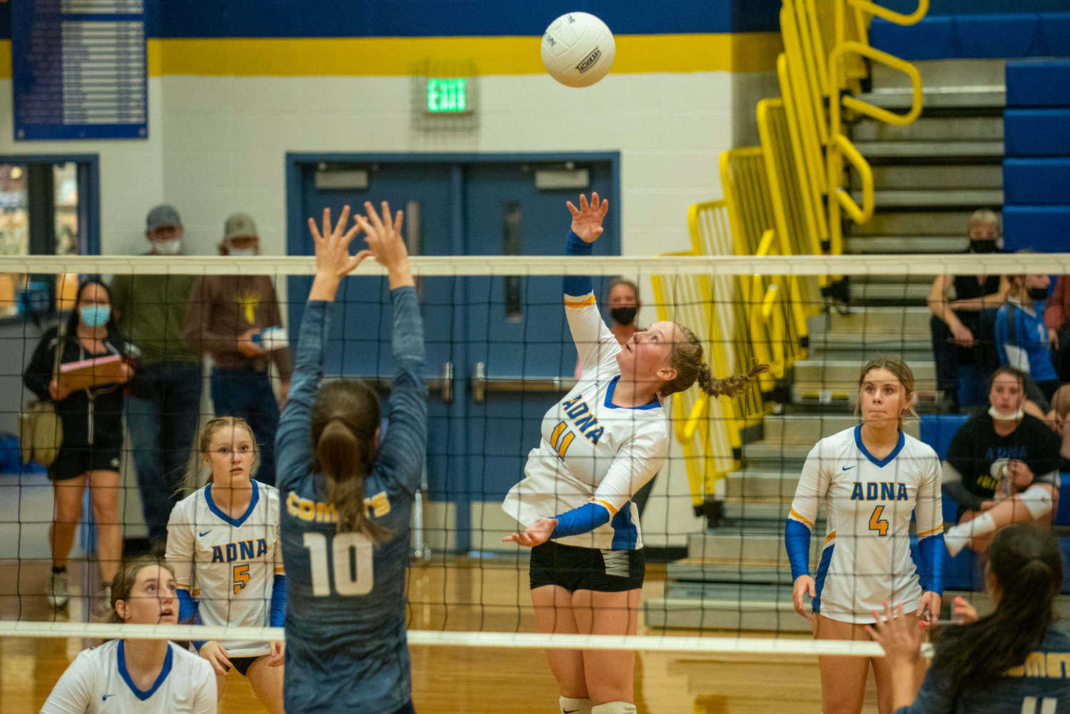 FILE PHOTO -- Adna middle hitter Kendall Humphrey send the ball over against Naselle earlier this season.