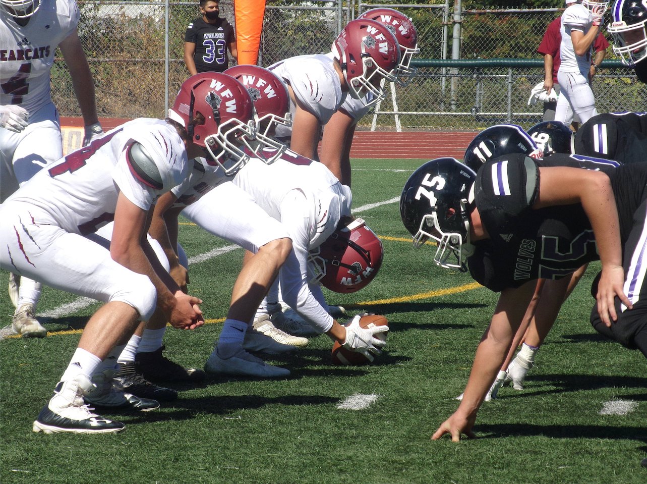 W.F. West's offense lines up to take on Heritage on Saturday in Vancouver.