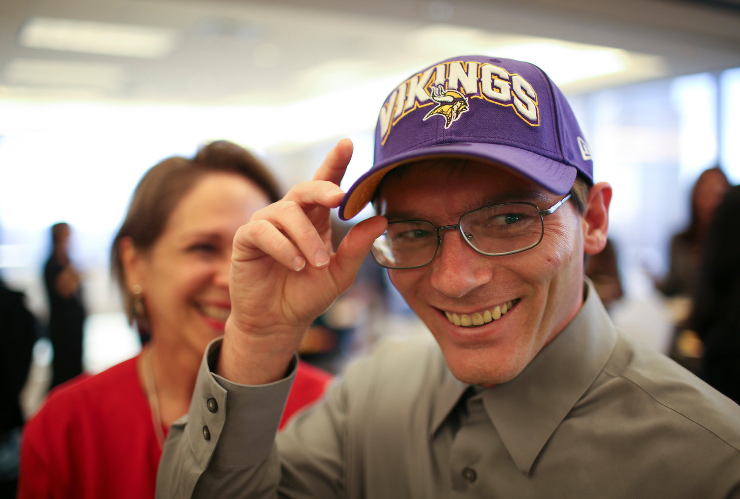 A Minnesota Vikings cap was one of the gifts Damon Thibodeaux received at a reception at Fredrikson & Byron to welcome him to Minneapolis on October 12, 2012. (Jeff Wheeler/Minneapolis Star Tribune/TNS)