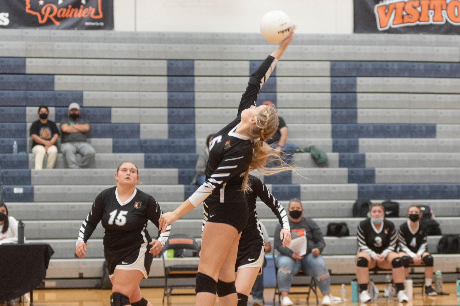 Morton-White Pass junior Breejah Townsend hits a spike in the Timberwolves win over Rainier Tuesday night.