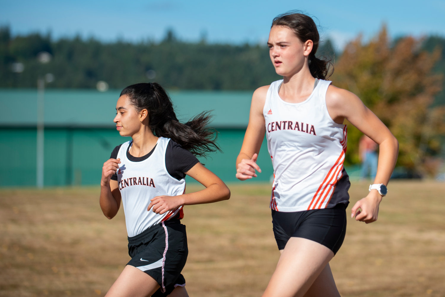 Centralia's Ruth Gonzalez, left, and Kira Jones take off from the starting line of a dual meet against W.F. West on Wednesday.