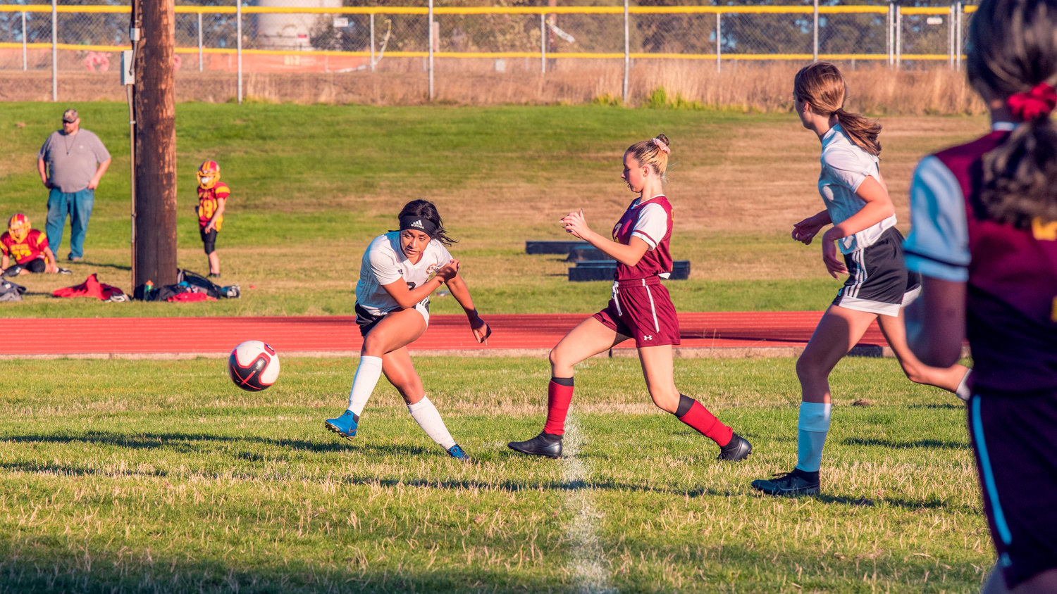 FILE PHOTO -- Napavine’s Makensee Taliaferro Bouge (2) kicks the ball down field during a game against Winlock earlier this season.