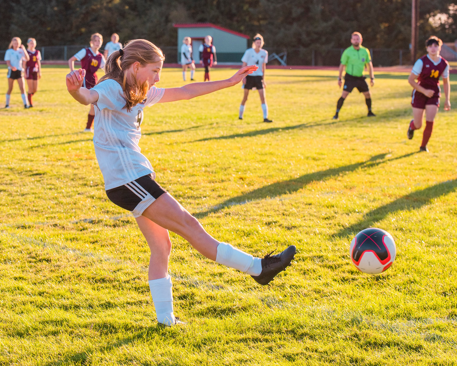 FILE PHOTO -- Napavine’s Hannah Fay (9) passes the ball during a game against Winlock on Sept. 15, 2021.