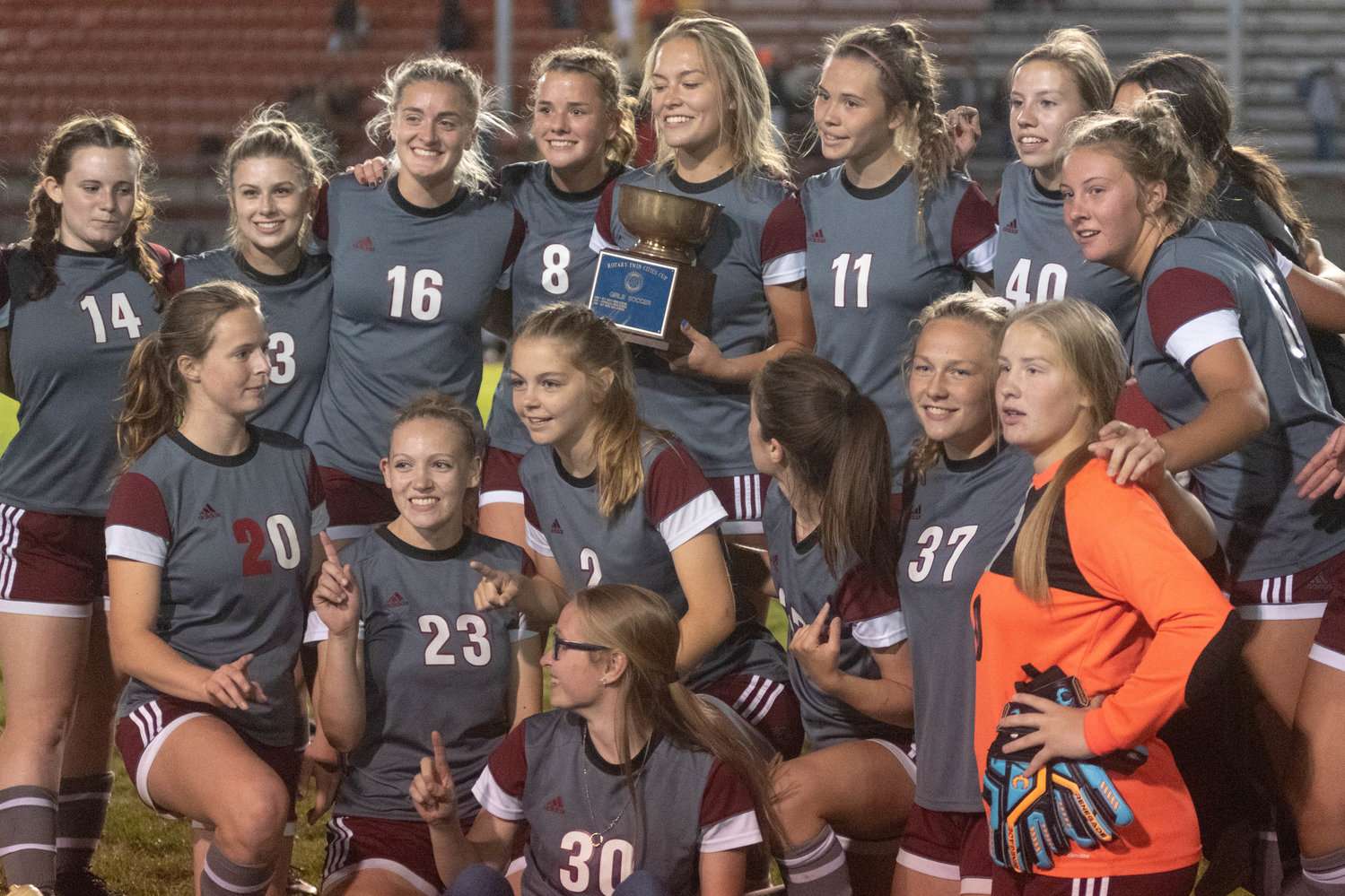 The W.F. West girls soccer team celebrates with the Rotary Cup after defeating Centralia Thursday night, 5-0.