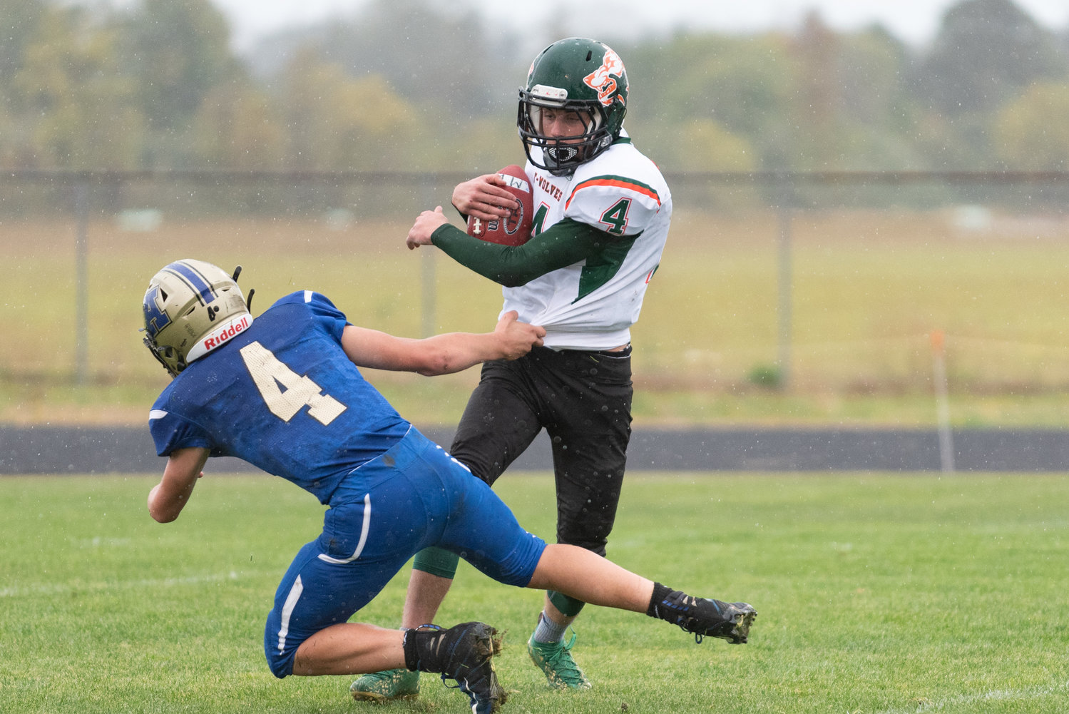 MWP quarterback Layten Collette eludes a tackler in the Timberwolves loss to Adna Saturday afternoon.