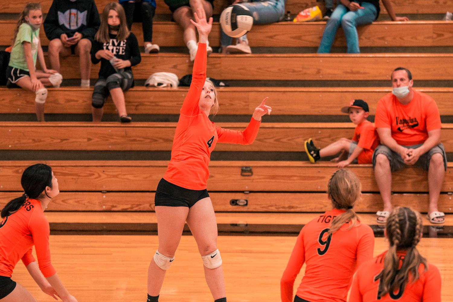 Napavine’s Grace Gall (4) returns a ball during a match at home against Toledo Tuesday night.