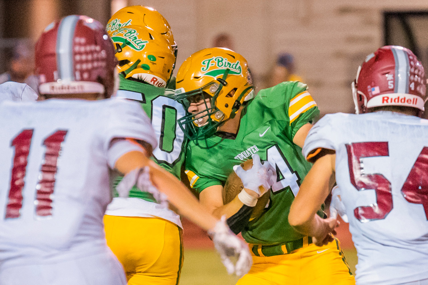 Tumwater’s Payton Hoyt (34) runs with the football during a game against W.F. West Friday night.