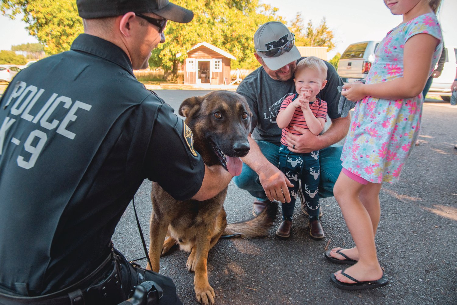 K-9 officer Stephen Summers brings out Samson to meet kids during a “Back the Blue” event in Adna on Saturday.