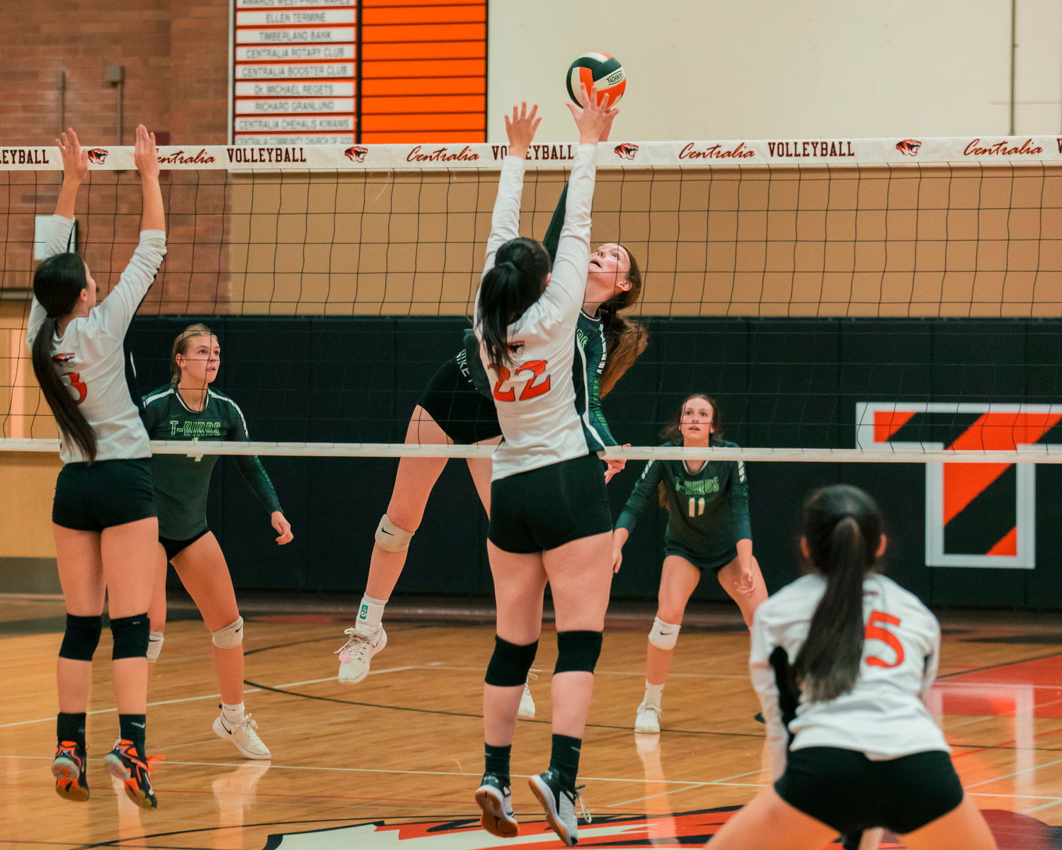 Tumwater’s Alyssa Duncan (1) hits the ball over the net during a volleyball game in Centralia Tuesday night.