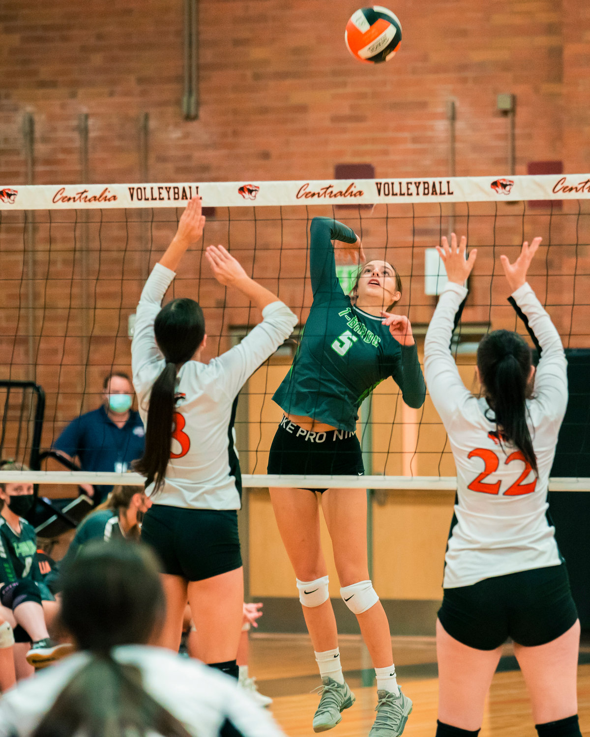 Tumwater’s Natalie Sumrok (5) goes up for the ball during a volleyball game in Centralia Tuesday night.