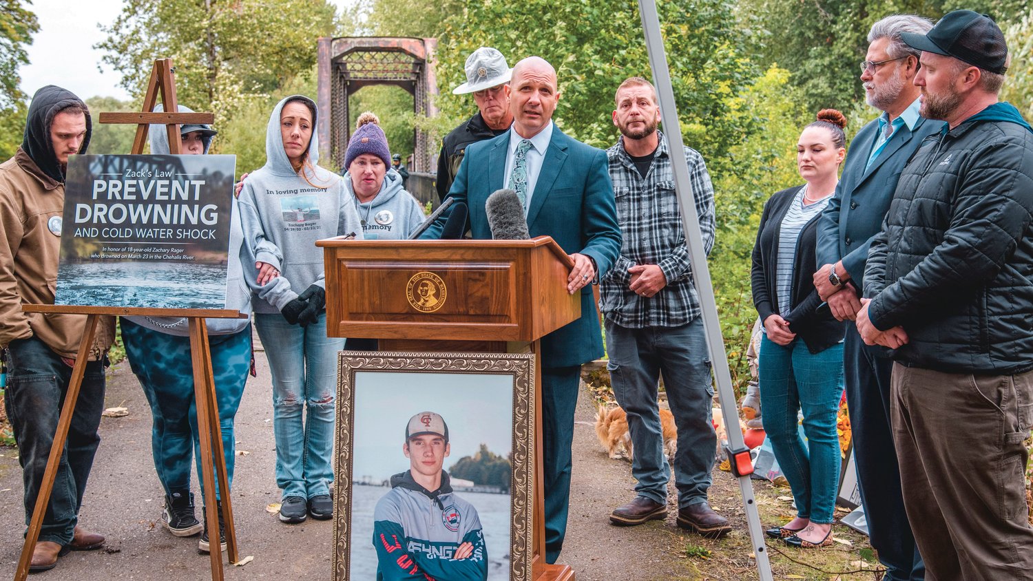 Rep. Peter Abbarno says “Zack’s Law will save lives,” during a press conference announcing upcoming legislation named in honor of Zachary Rager with a goal of raising awareness around cold water shock to prevent drownings, Wednesday near the Adna trestle along the Willapa Hills Trail.