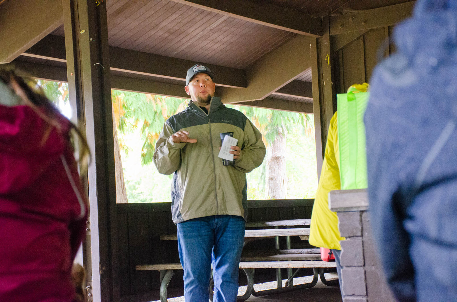 Cody Duncan, a manager with TransAlta Centralia Generation, speaks with Thurston County League of Women Voters and Sierra Club members Wednesday about the role his company takes in utilizing streamflow along the Skookumchuck River and how the reservoir dam regulates flow.