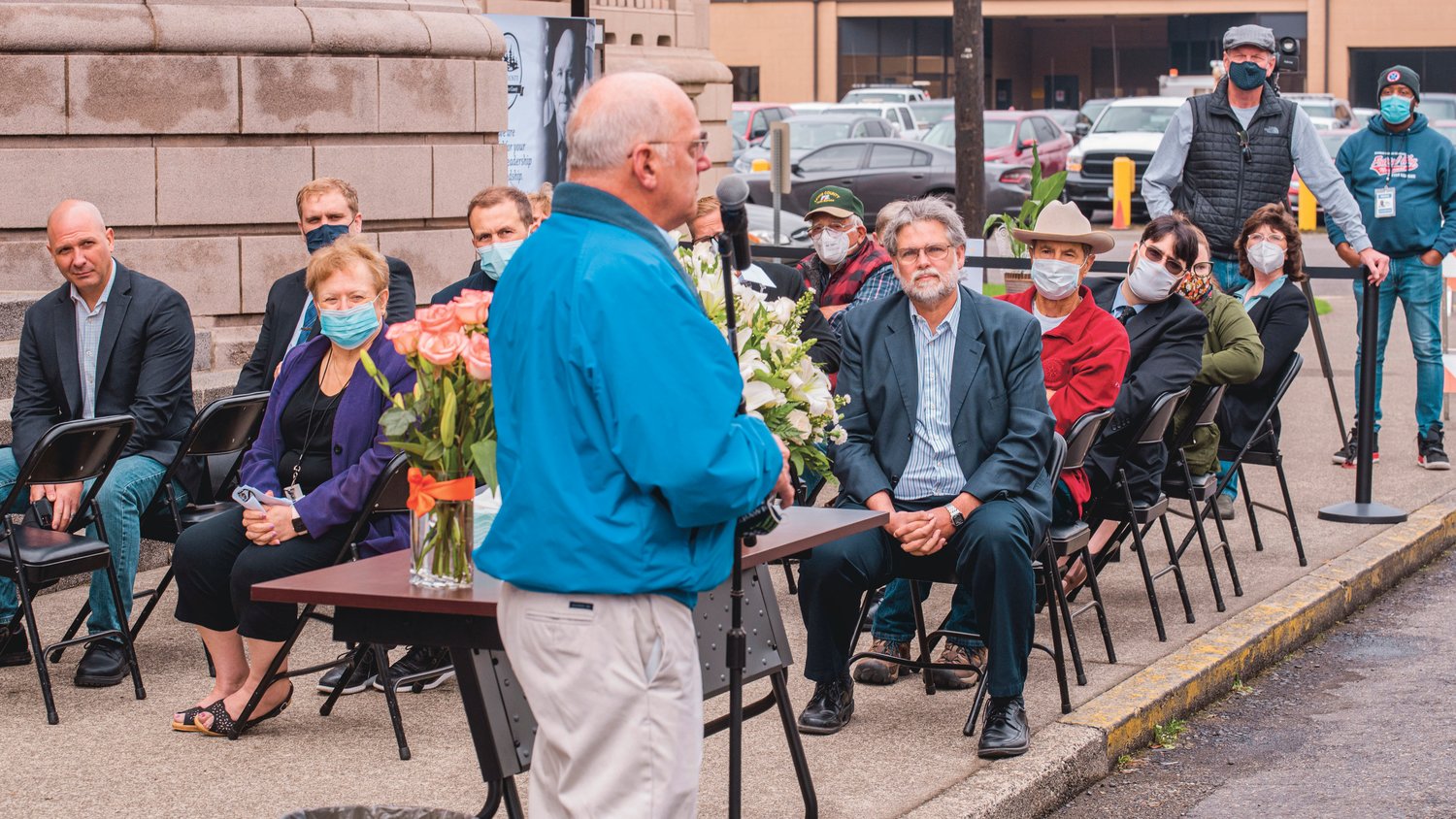 Community leaders and friends share stories about Gary Stamper during a ceremony honoring his life Friday morning outside the Lewis County Historical Courthouse in Chehalis.