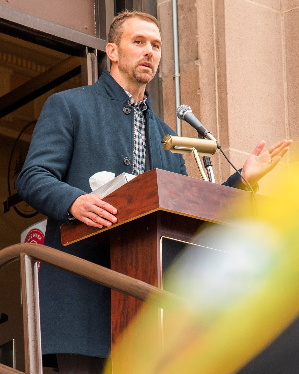 Commissioner Sean Swope talks about Gary Stamper and his neighborly spirit during a ceremony honoring his life riday morning at the steps of the Lewis County Historical Courthouse Friday morning in Chehalis.