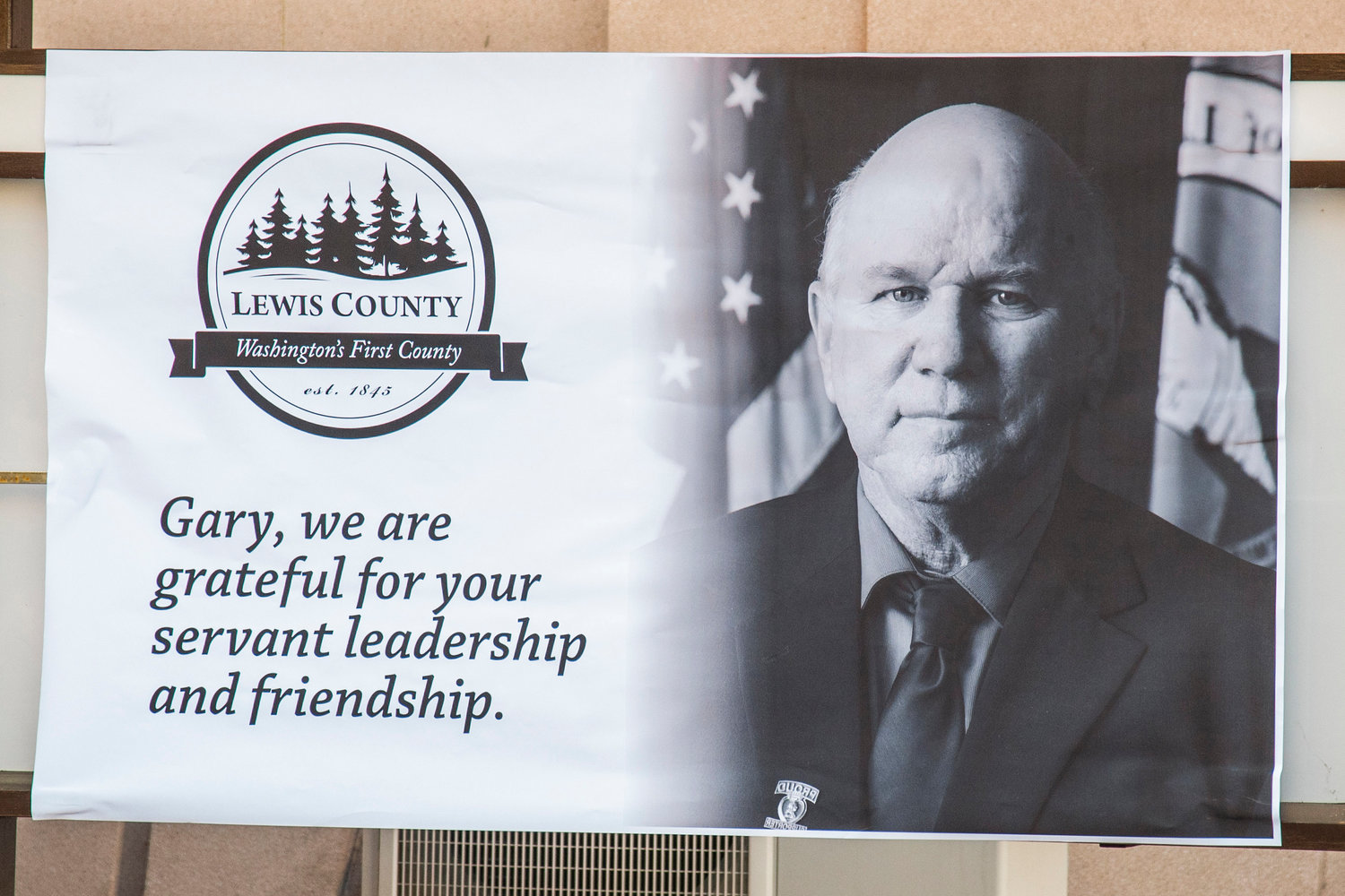 Signage outside the Lewis County Historic Courthouse reads, “Gary, we are garetful for your servant leadership and friendship,” Friday morning in Chehalis.