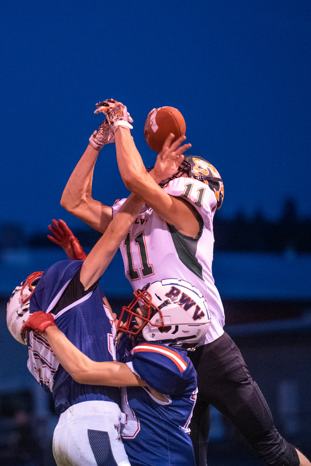 PWV's Kaidan Perkins (30) and Tyson Portmann (10) break up a pass intended for MWP's Hunter Hazen (11) during the second quarter on Friday, Oct. 1, 2021.