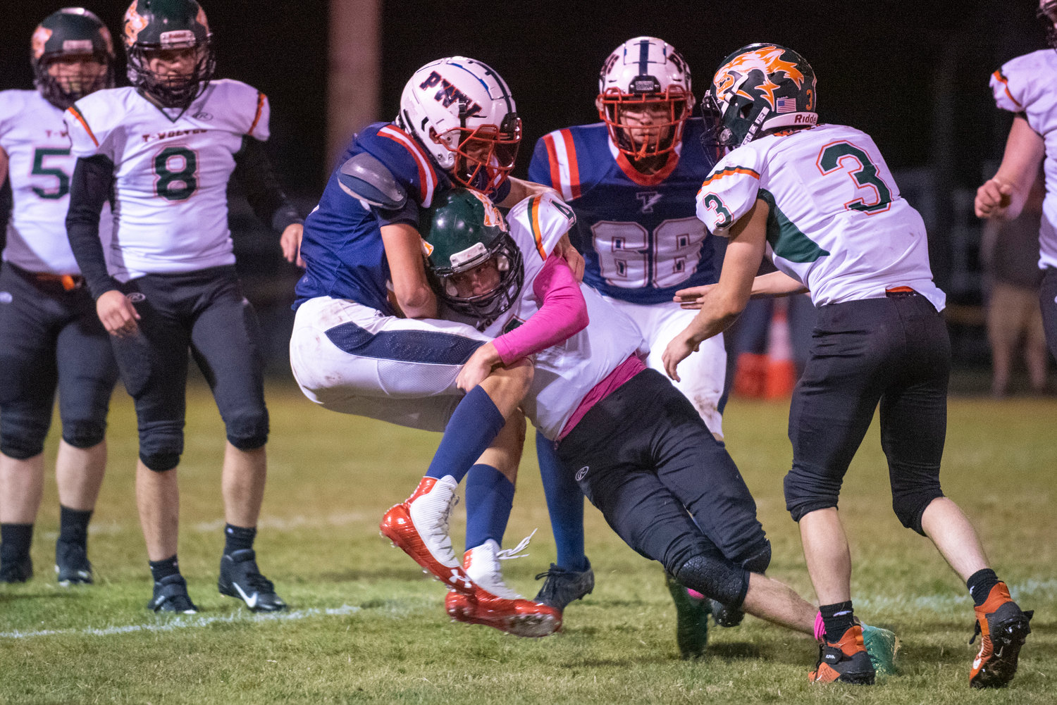 MWP's Layten Collette (4) makes a tackle on PWV's Wil Clements (5) on Oct. 1, 2021.