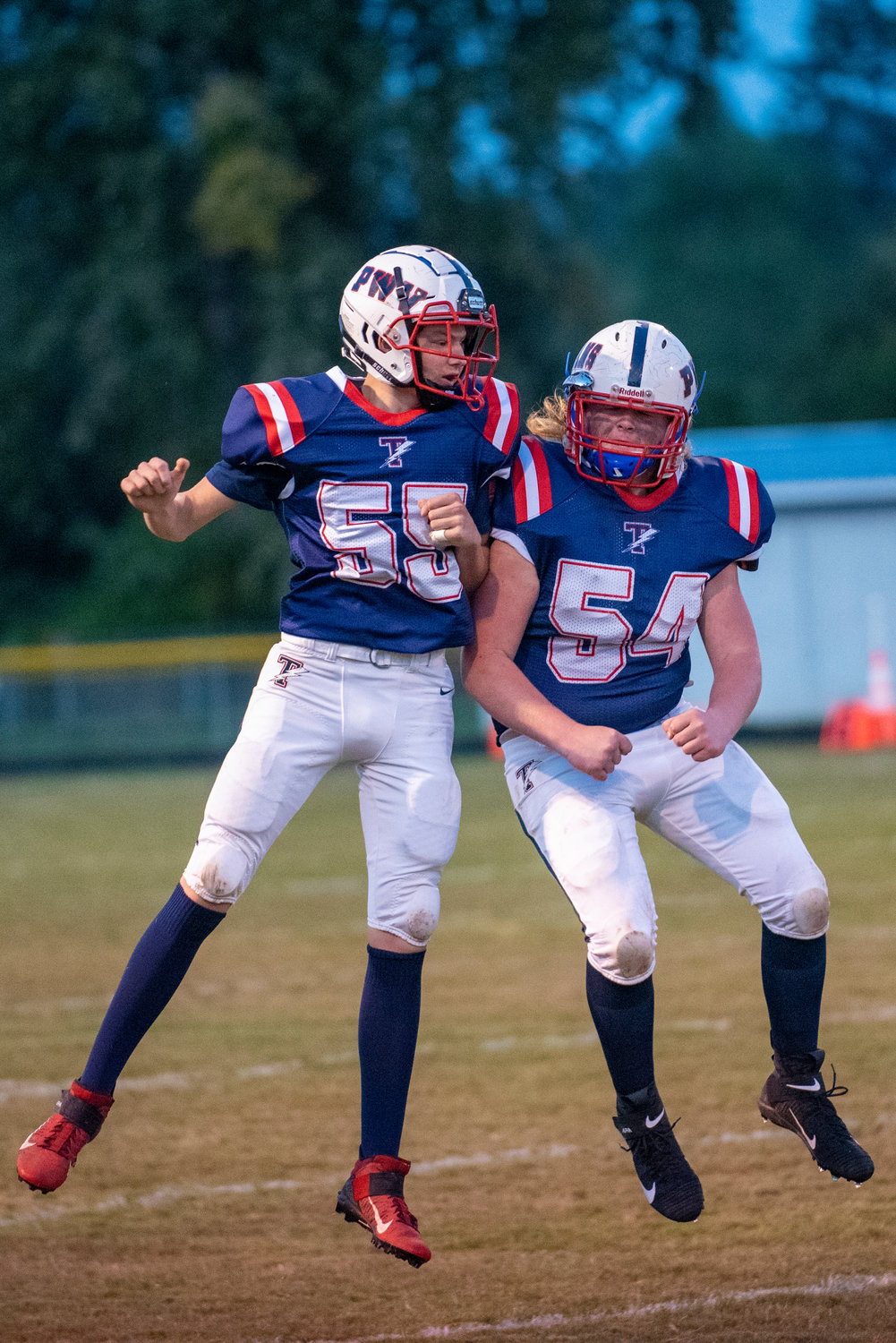 Pe Ell-Willapa Valley's Jesse Justice (55) and Connor Keeton (54) get pumped up in pregame for a home match against Morton-White Pass on Oct. 1, 2021.