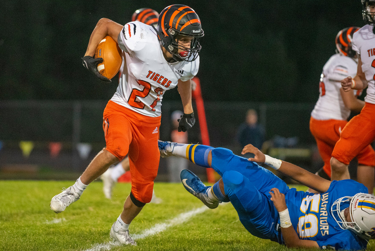 Centralia’s Anthony Saucedo (27) escapes a would-be Rochester tackler on Saturday, Oct. 2, 2021.