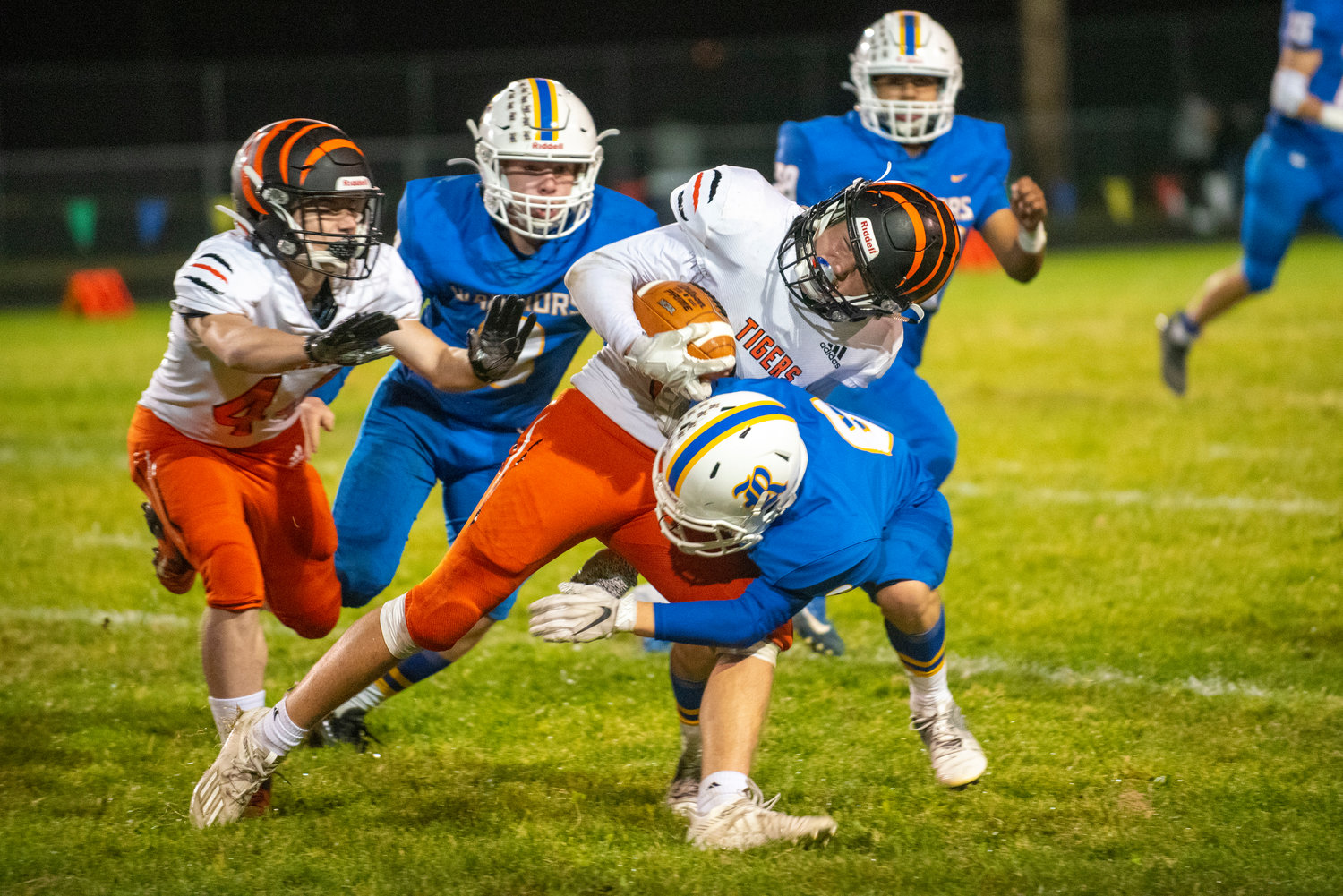 Rochester’s Carson Rotter (6) gets a big hit on Centralia’s Blake Seymour (33) on a kick return on Oct. 2, 2021.