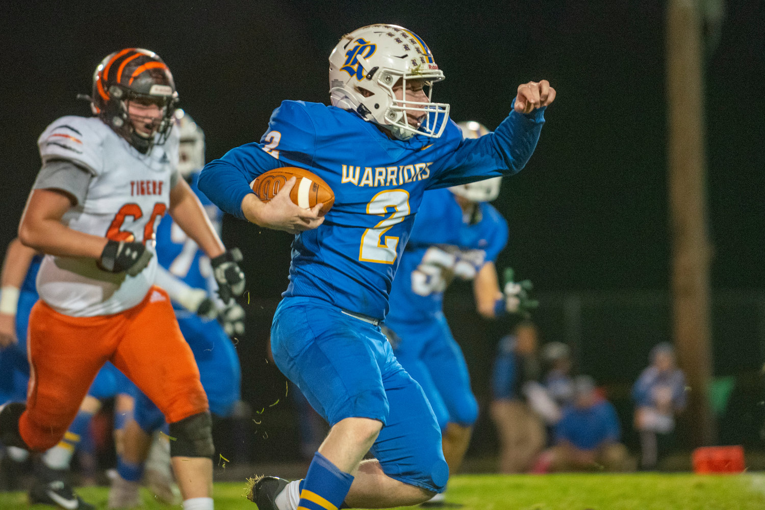 Rochester’s Tate Quarnstrom (2) finds running room against Centralia on Oct. 2, 2021.