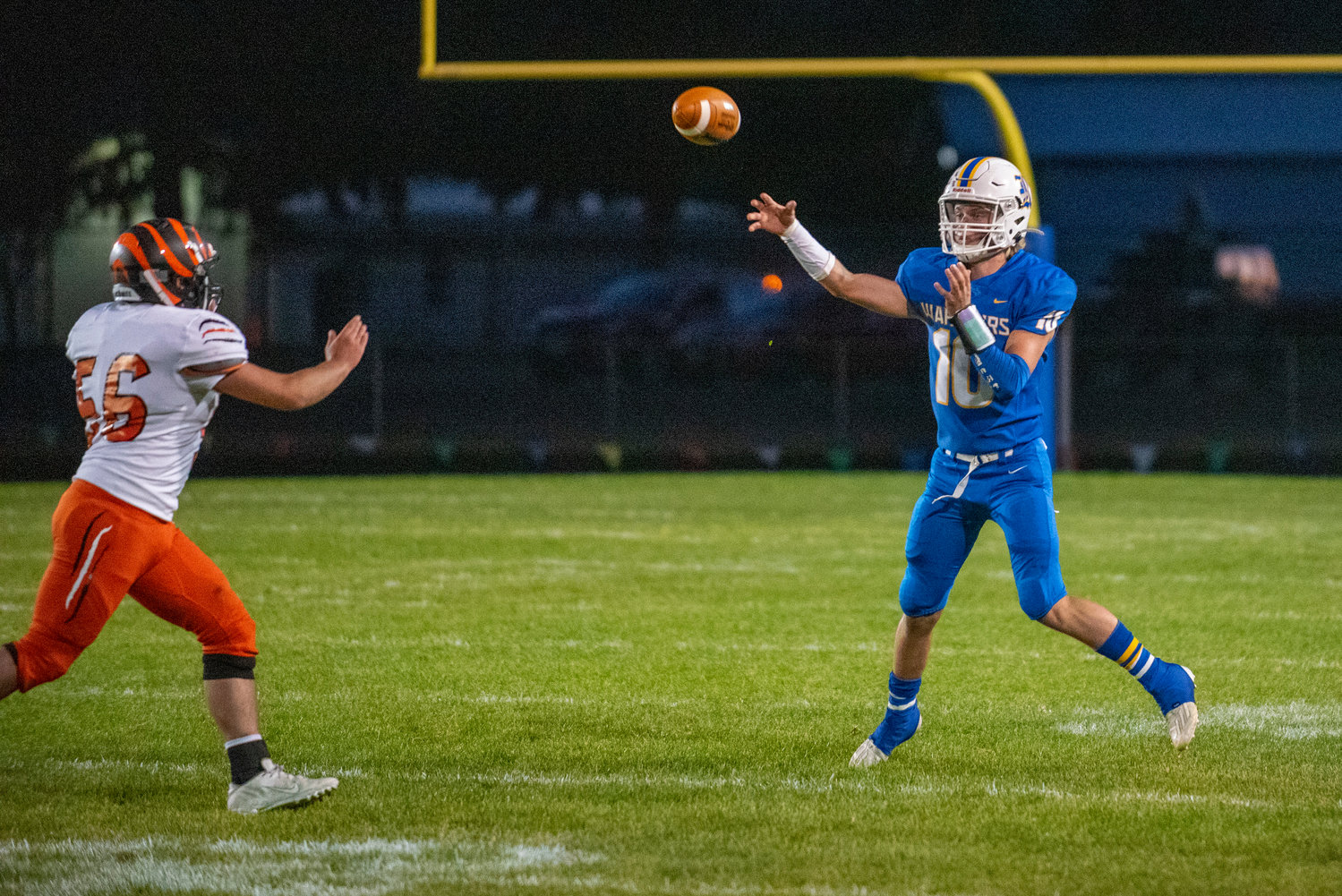 Rochester’s Landon Hawes (10) uncorks a throw before a Centralia lineman reaches him on Oct. 2, 2021.
