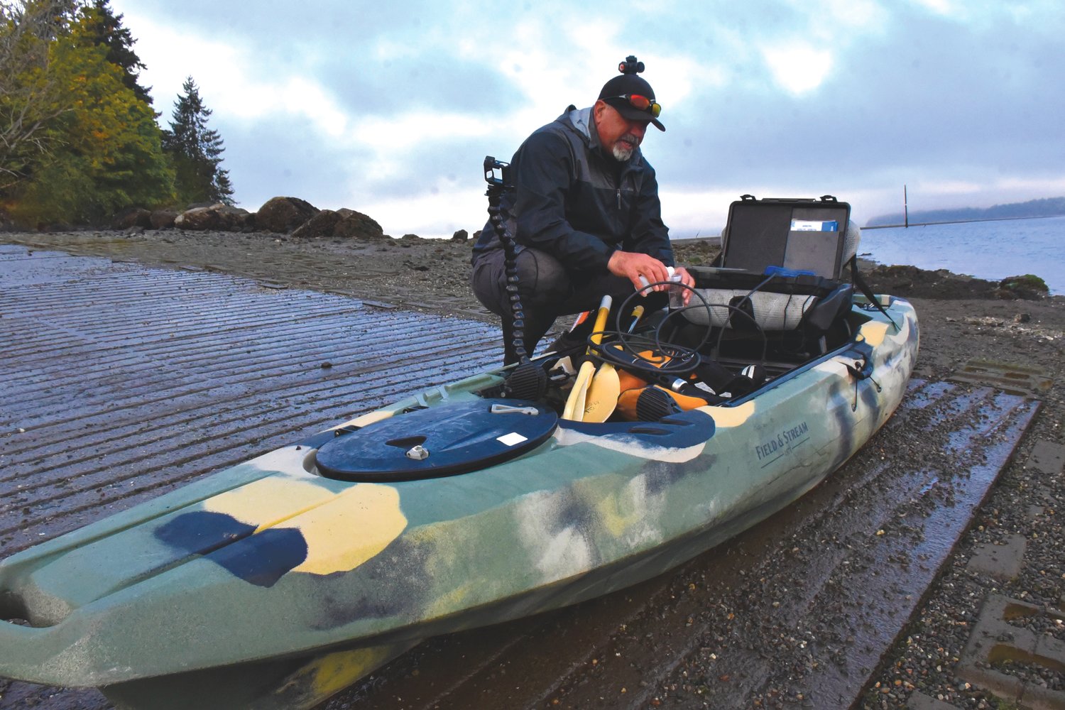 Brian Footen tests his water quality reader as he prepares to map the nearshore of the Nisqually Delta.