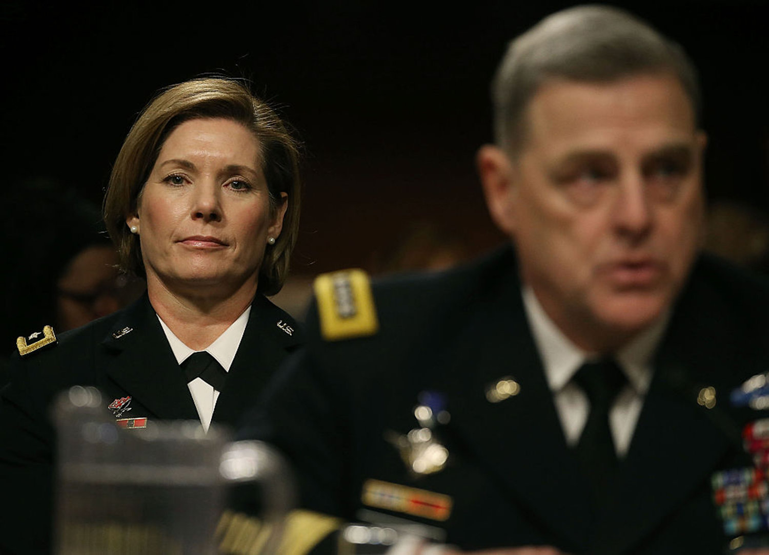 U.S. Army Gen. Laura Richardson sits behind U.S. Army Chief of Staff Mark Milley while he testifies about women in the military during a Senate Armed Services Committee hearing on Capitol Hill, Feb. 2, 2016, in Washington, D.C. The issue of women and the draft has come up in Congress recently. (Mark Wilson/Getty Images/TNS)