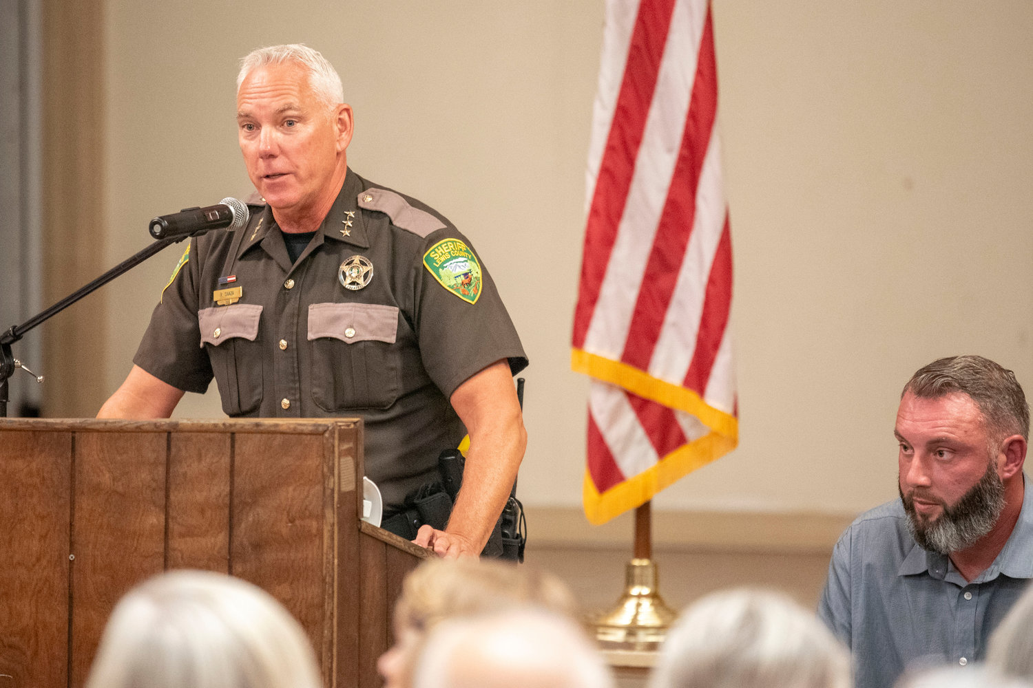 Sheriff Rob Snaza addresses crowds during a Lewis County Republicans Meeting Monday evening discussing mandates and remembering his friend Gary Stamper.