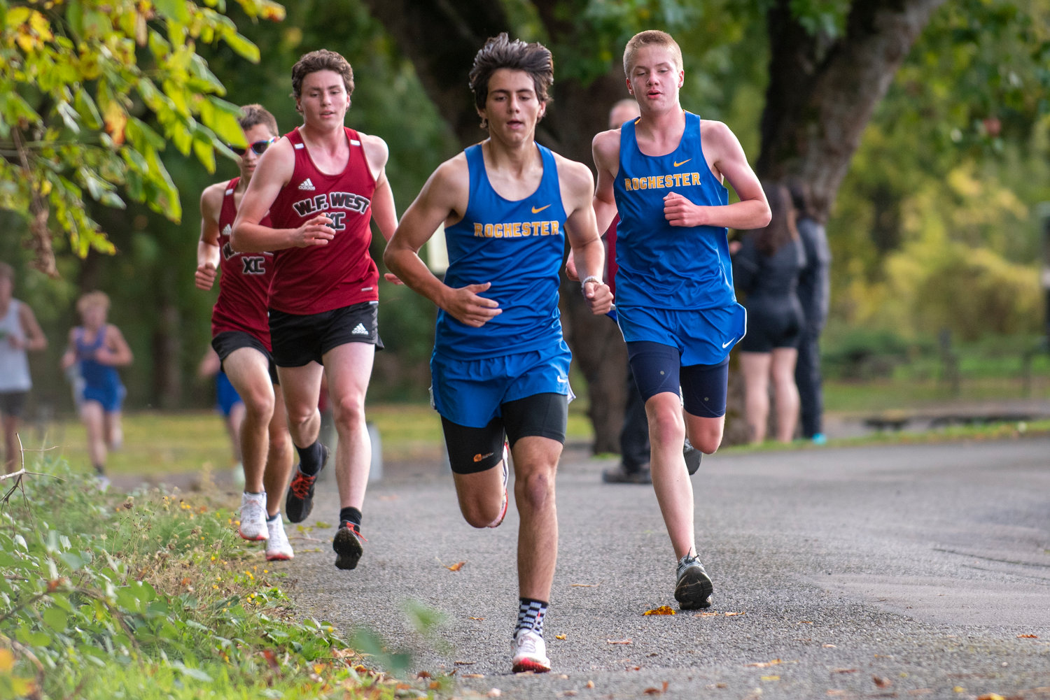 From left, W.F. West's Jaysen Miles, W.F. West's Henry Jordan, Rochester's Gabe Stuard and Rochester's Gunnar Morgan compete at Stan Hedwall Park on Wednesday, Oct. 6, 2021.