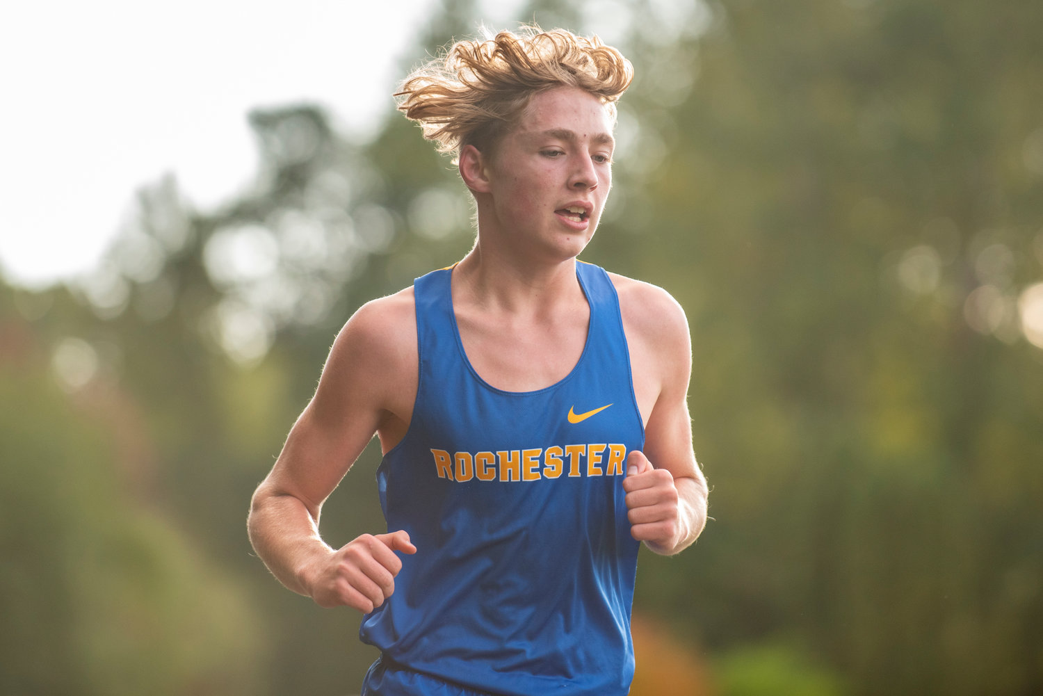 Rochester's Taydee Evenstar races in a cross country meet at Stan Hedwall Park on Wednesday, Oct. 6, 2021.