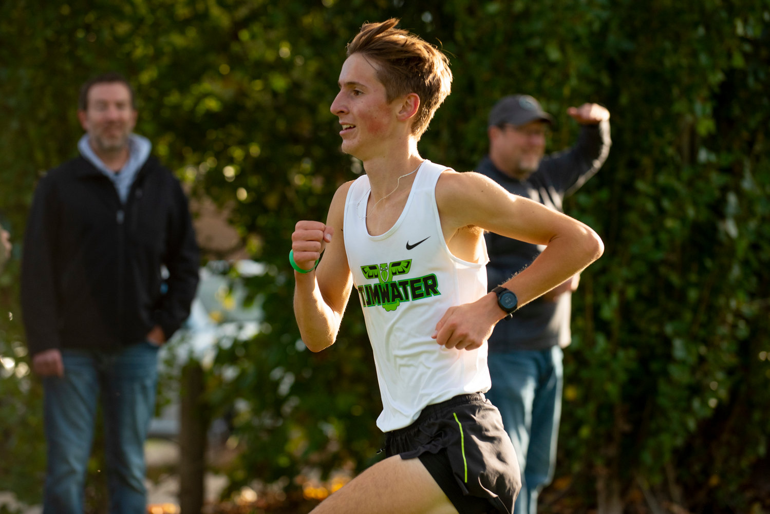 Tumwater's John Hoffer crosses the finish line in first place at a meet in Stan Hedwall Park on Wednesday, Oct. 6, 2021.